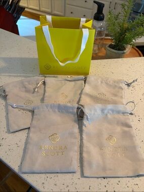 Kendra Scott Beige Jewelry Pouches with Yellow Gift Bag